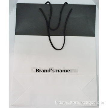 FDT customized white and black wood-free paper varnishing logo printed shopping paper bag for cloth
